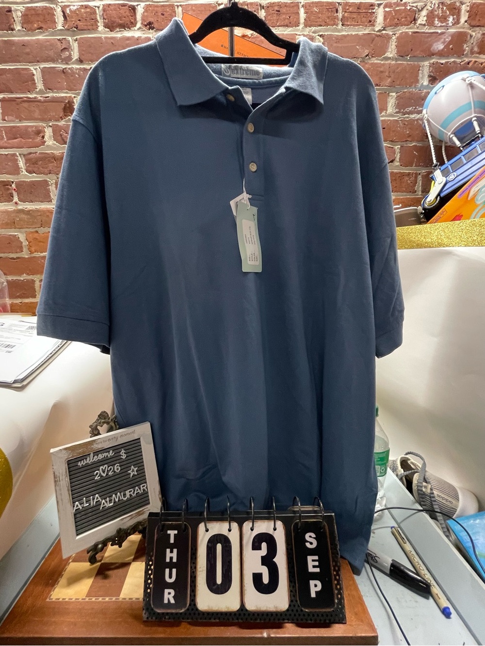Extreme" collar tag and a button